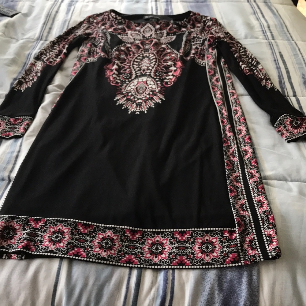 Knee length sleeved dress